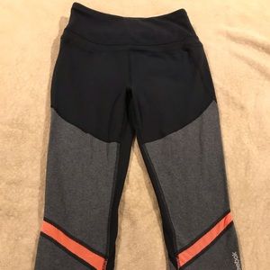 Athletic capris, just below the knee